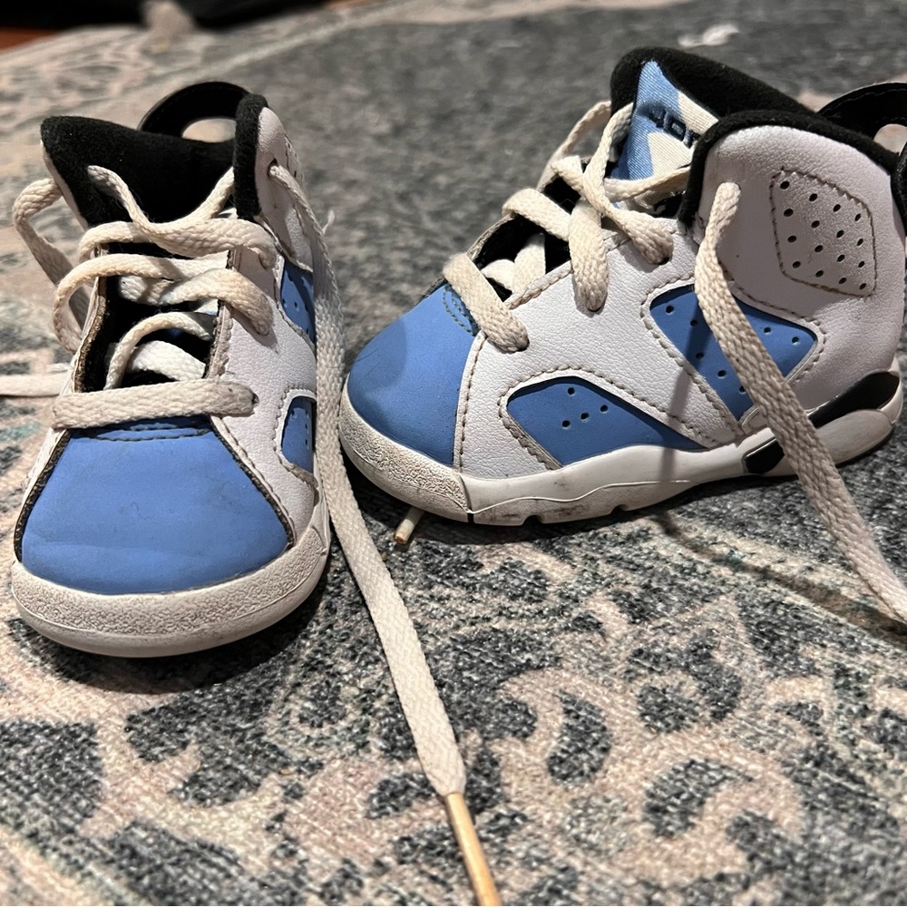 Air Jordan’s baby blue white and black Nike baby